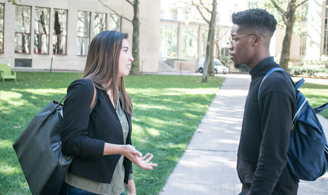 two people talking intensely